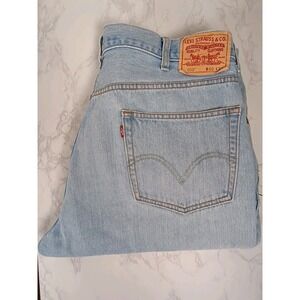 Vintage Levi's 550 Mens Blue Jeans Size 40x30 Relaxed Fit Light Wash Red Tab Y2K